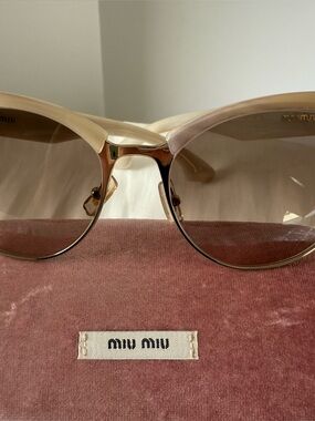 Miu Miu Cream Frame Sunglasses with Gradient Brown Lenses and Gold Accents